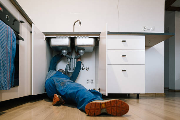 Professional Drain Cleaning technician working in Millburn, NJ